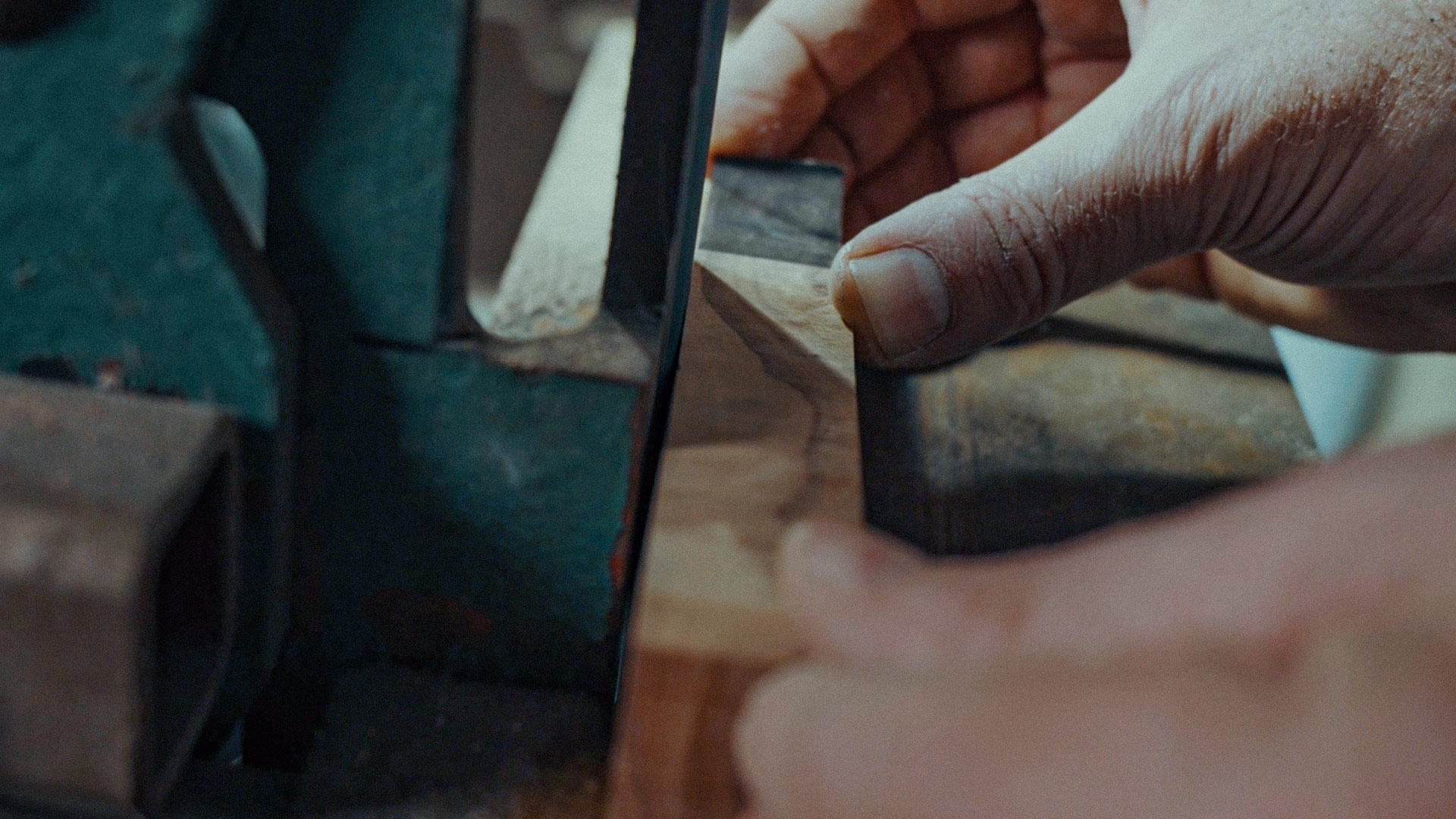 Shaping a wooden handle by hand